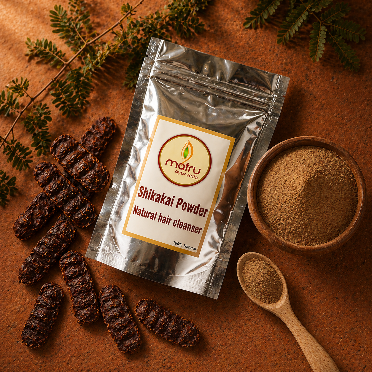 Dried Shikakai Acacia concinna pods and brown powder in a wooden bowl beside Matru Ayurveda pouch — pure natural hair cleanser source ingredient